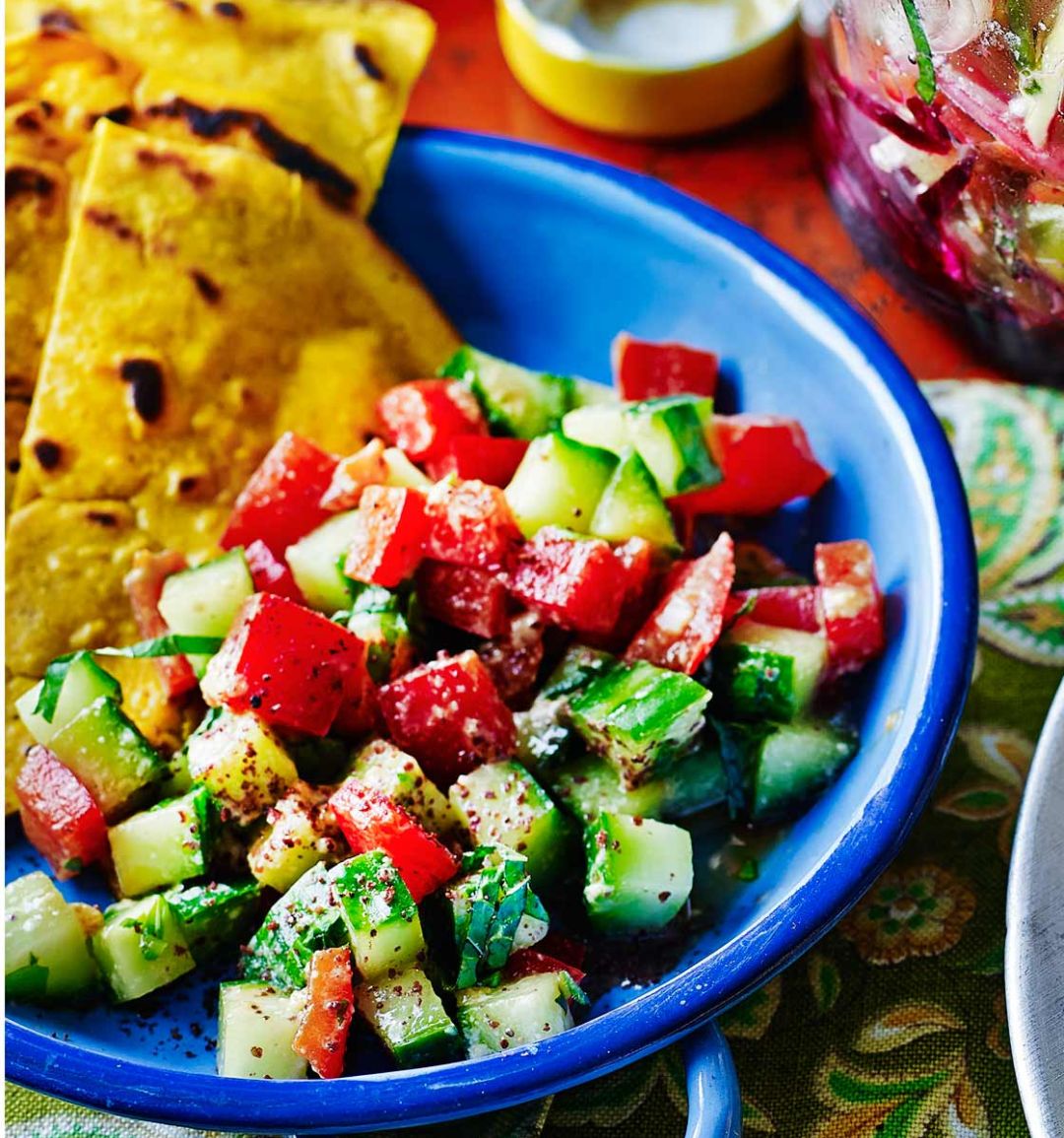 Turmeric socca with cucumber, pepper and tahini salad