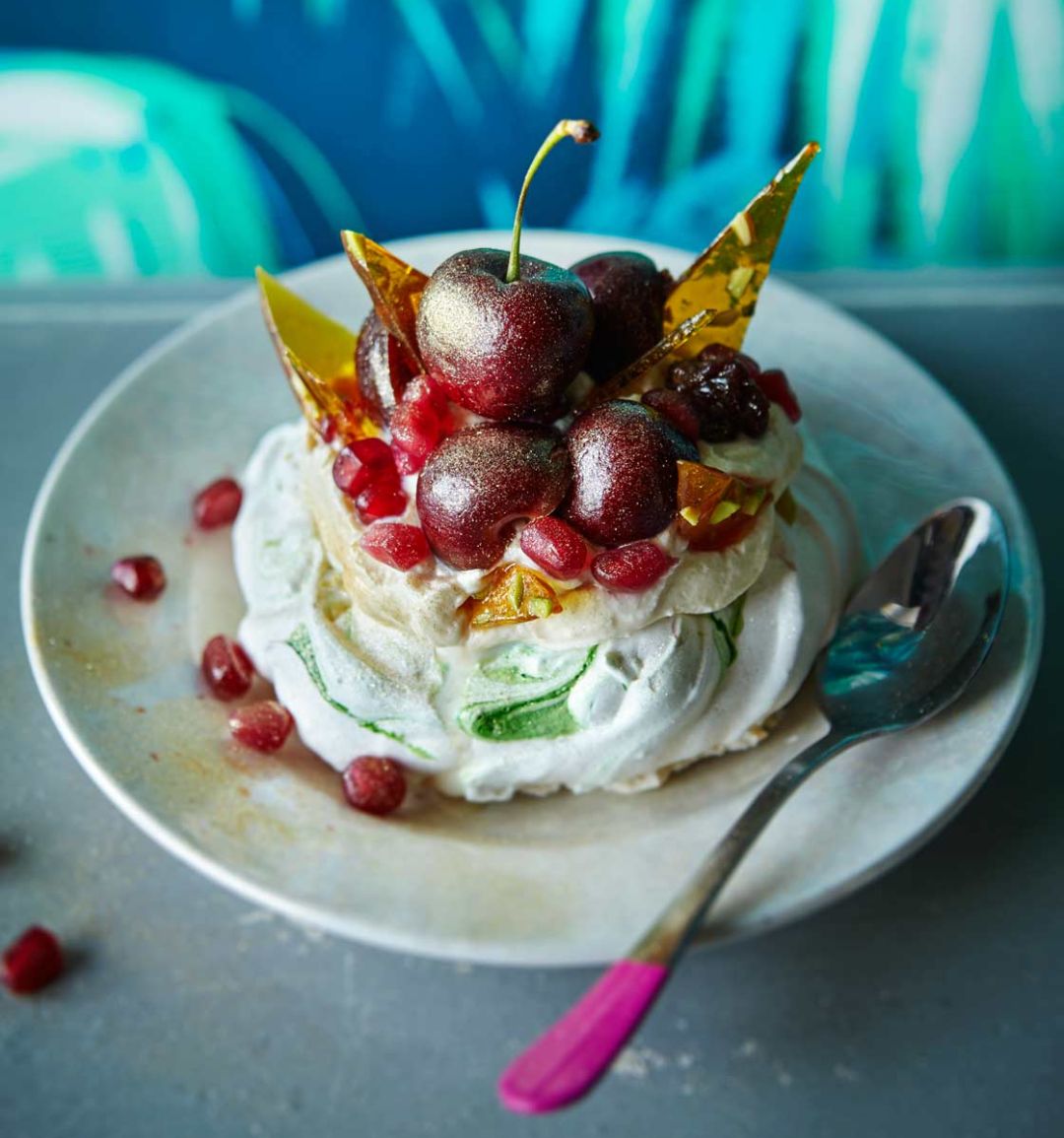 Pistachio pavlovas with boozy cherries