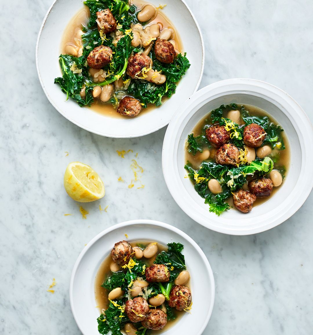 Sausage, kale and butter bean one-pot
