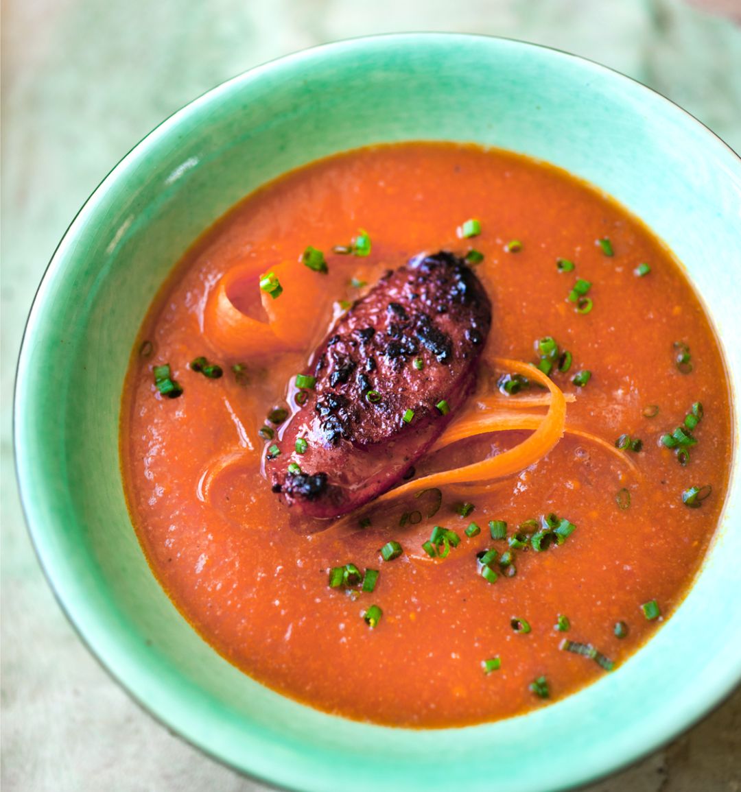 Spring carrot and chorizo soup