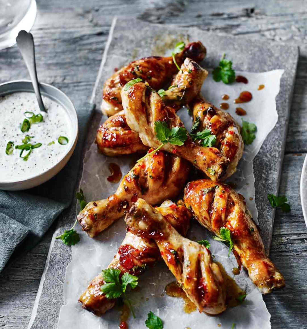 Spiced marmalade chicken drumsticks with blue cheese sauce