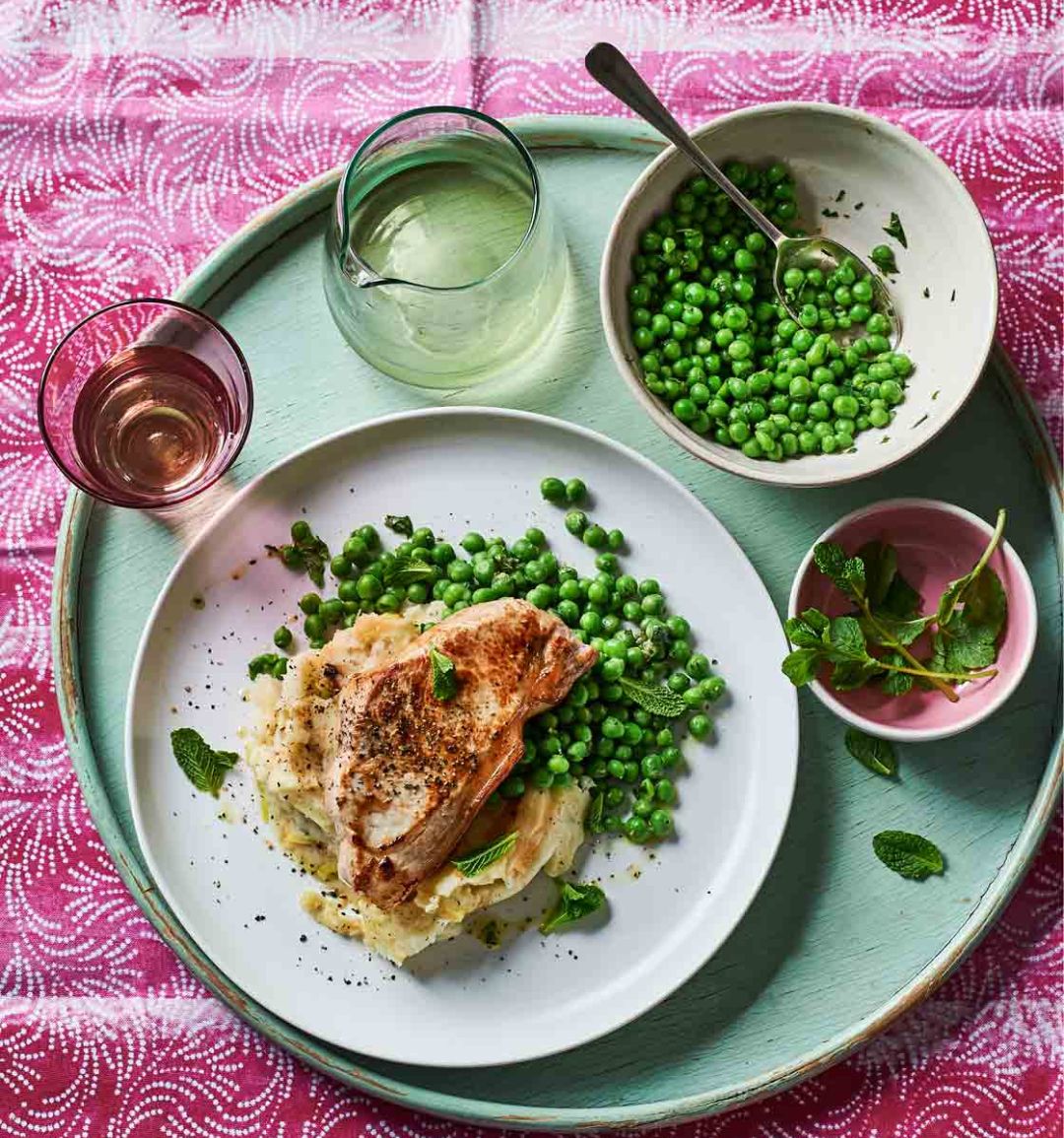 Pork steaks with leek champ and minty peas