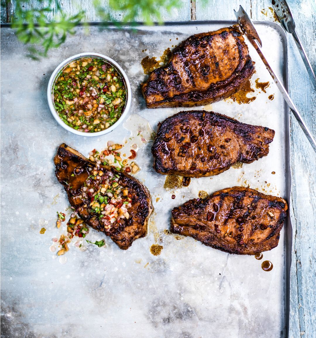 Sweet soy pork steaks with peanut dipping sauce