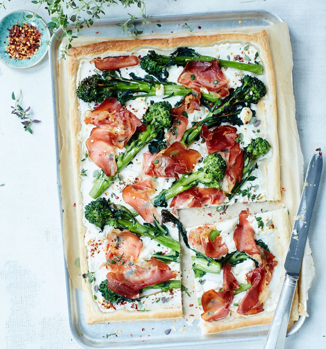 Broccoli, goats' cheese and prosciutto tart