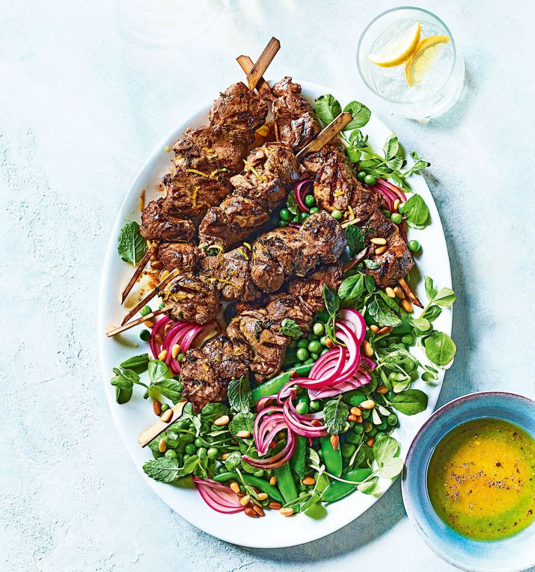 Lamb kebabs with summer pea salad