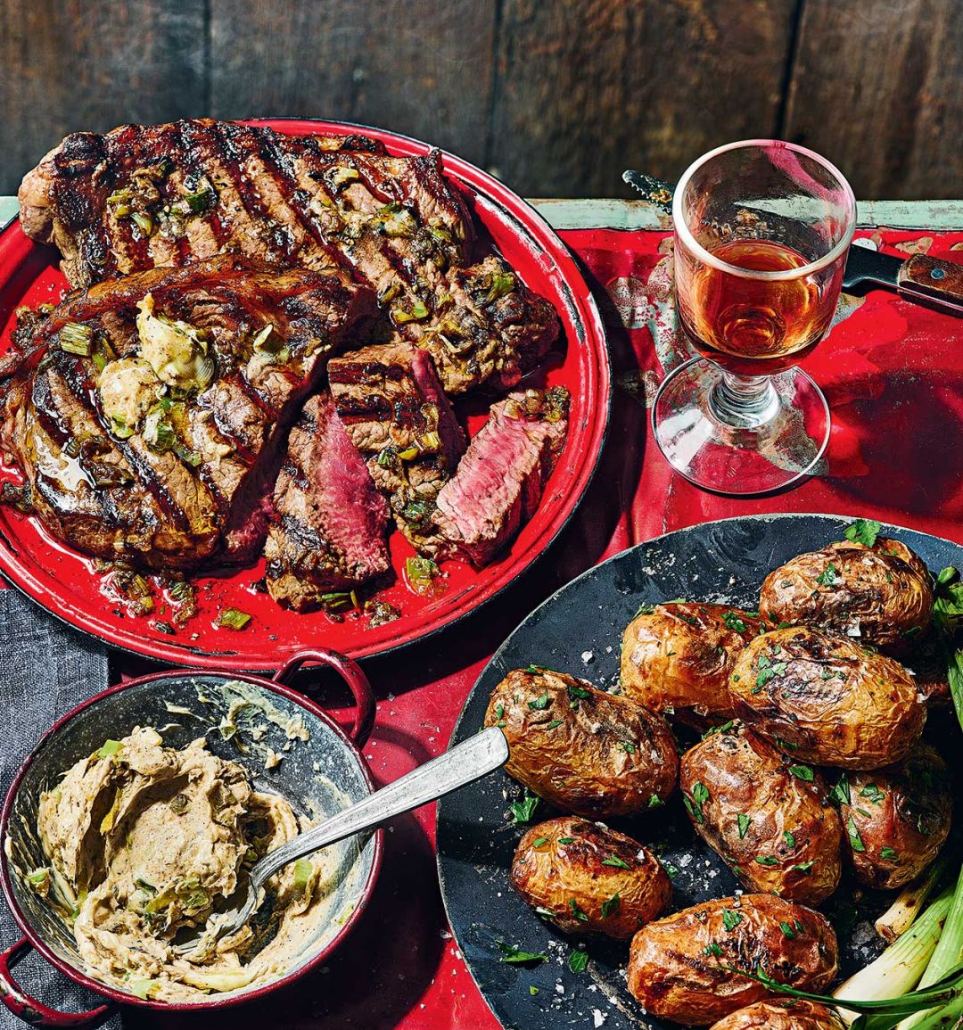 Steak with roasted garlic and burnt spring onion butter
