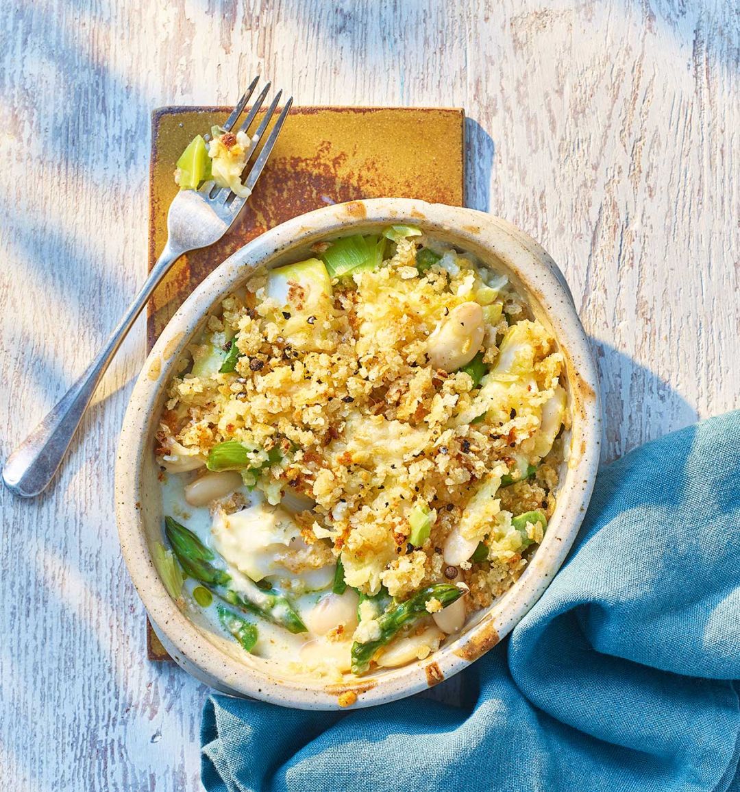 Smoked haddock, asparagus and bean gratin