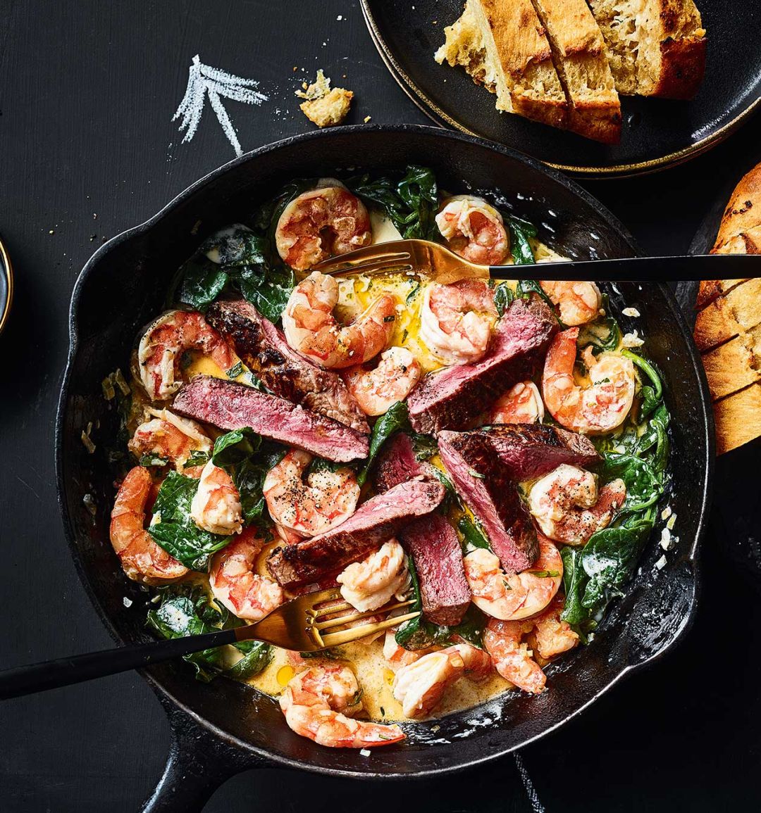 Surf and turf skillet with garlic dippers