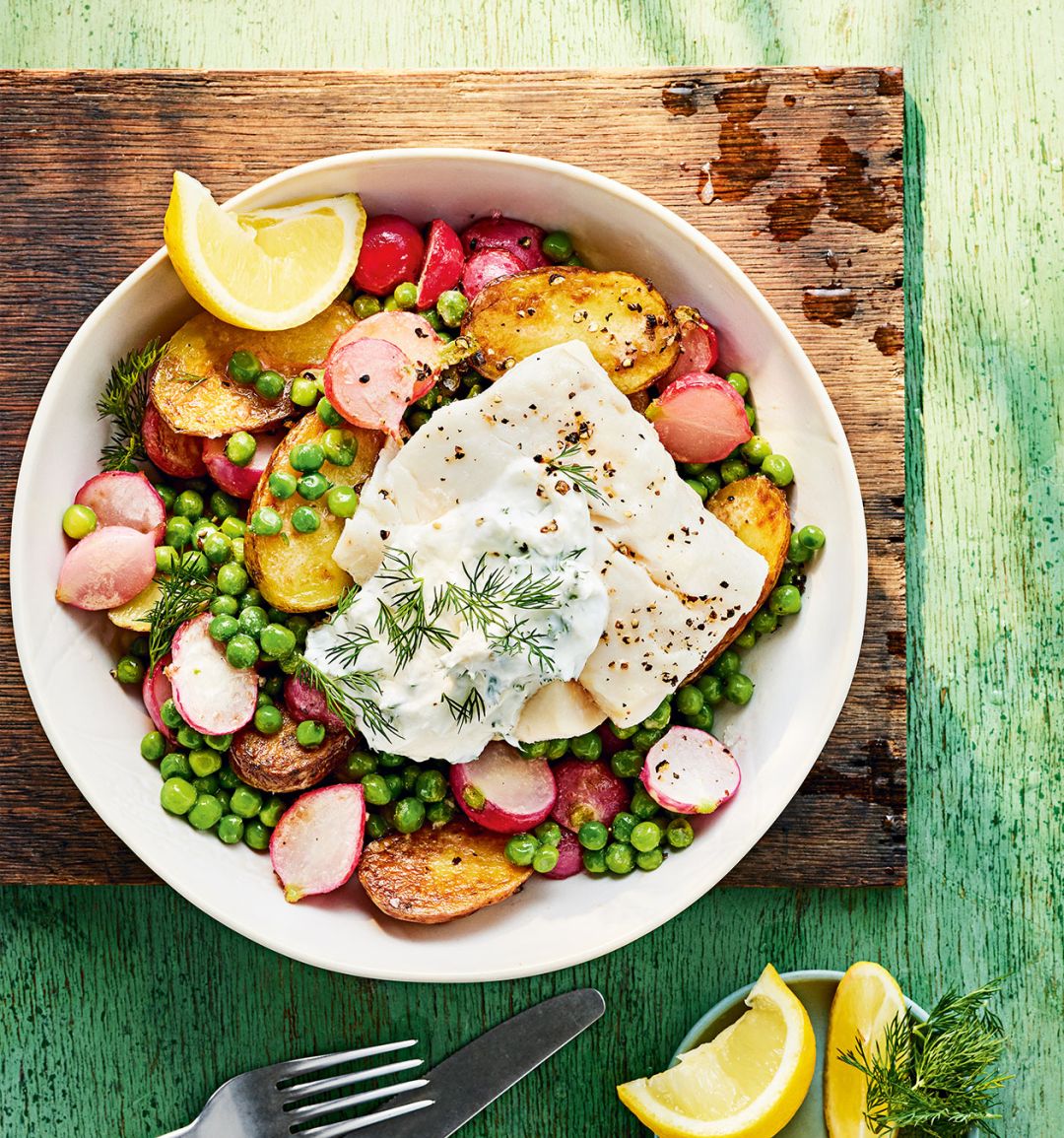 Cod Veggie Cod with spring veg and dill yogurt recipe | Sainsbury`s Magazine
