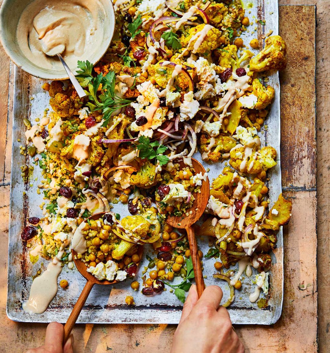 Spiced and roasted cauliflower with herby bulgur wheat and tahini