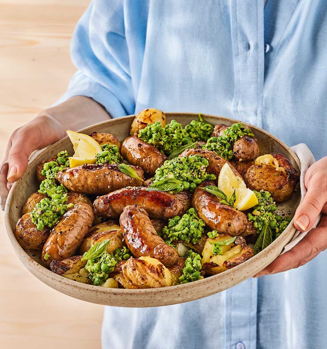 Bangers and 'smash' platter with minty pea pesto