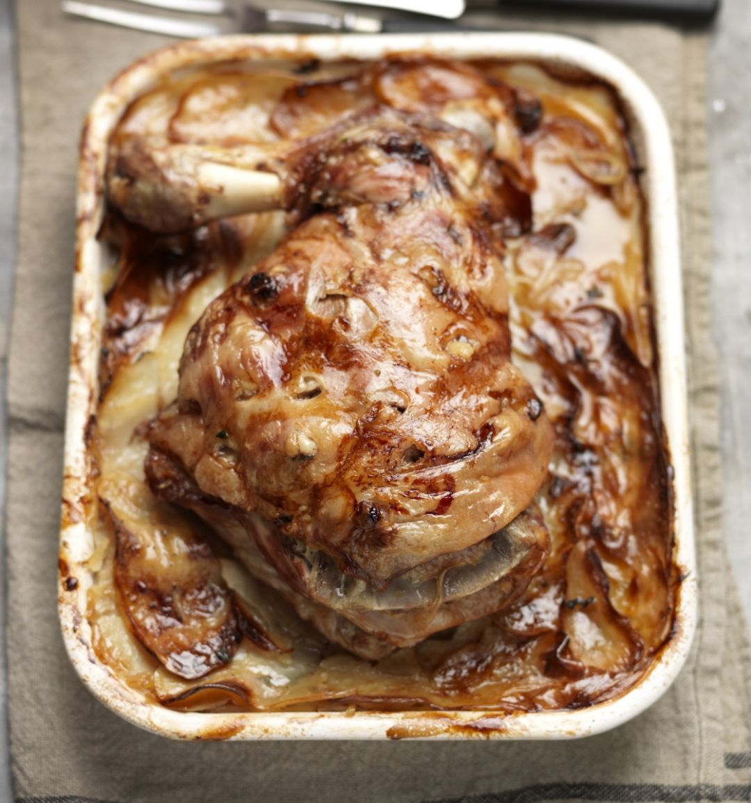 Slow roast lamb with boulangère potatoes  