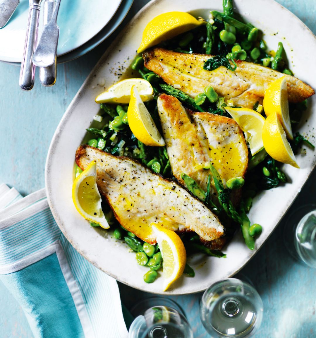 Sea bass with asparagus, broad beans and spinach