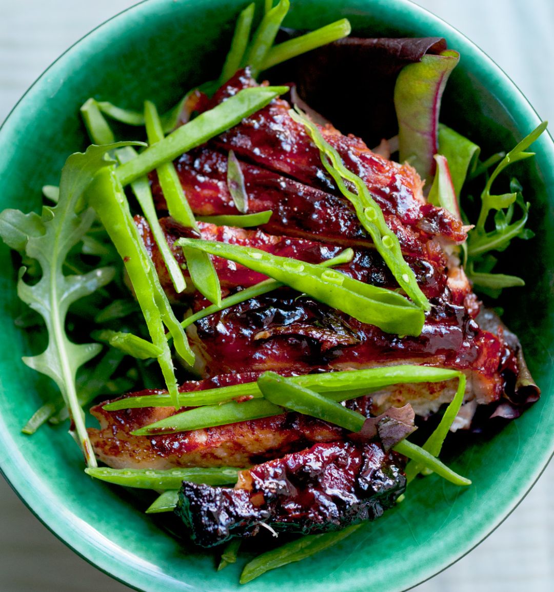 Pork chops, mint, mangetout and spring leaves