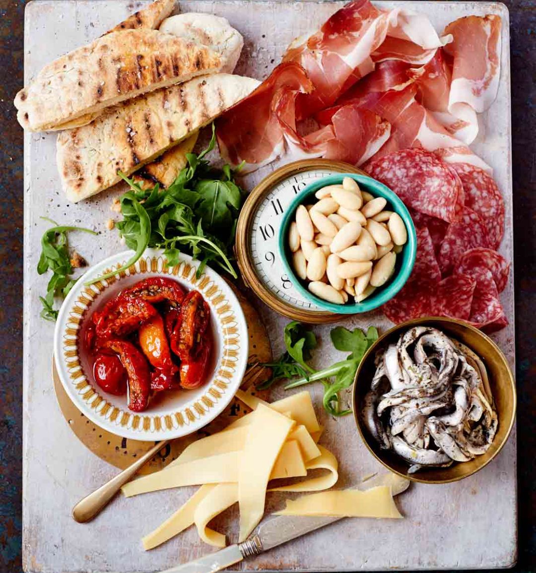 Deli-style antipasti platter with speedy homemade garlic flatbreads