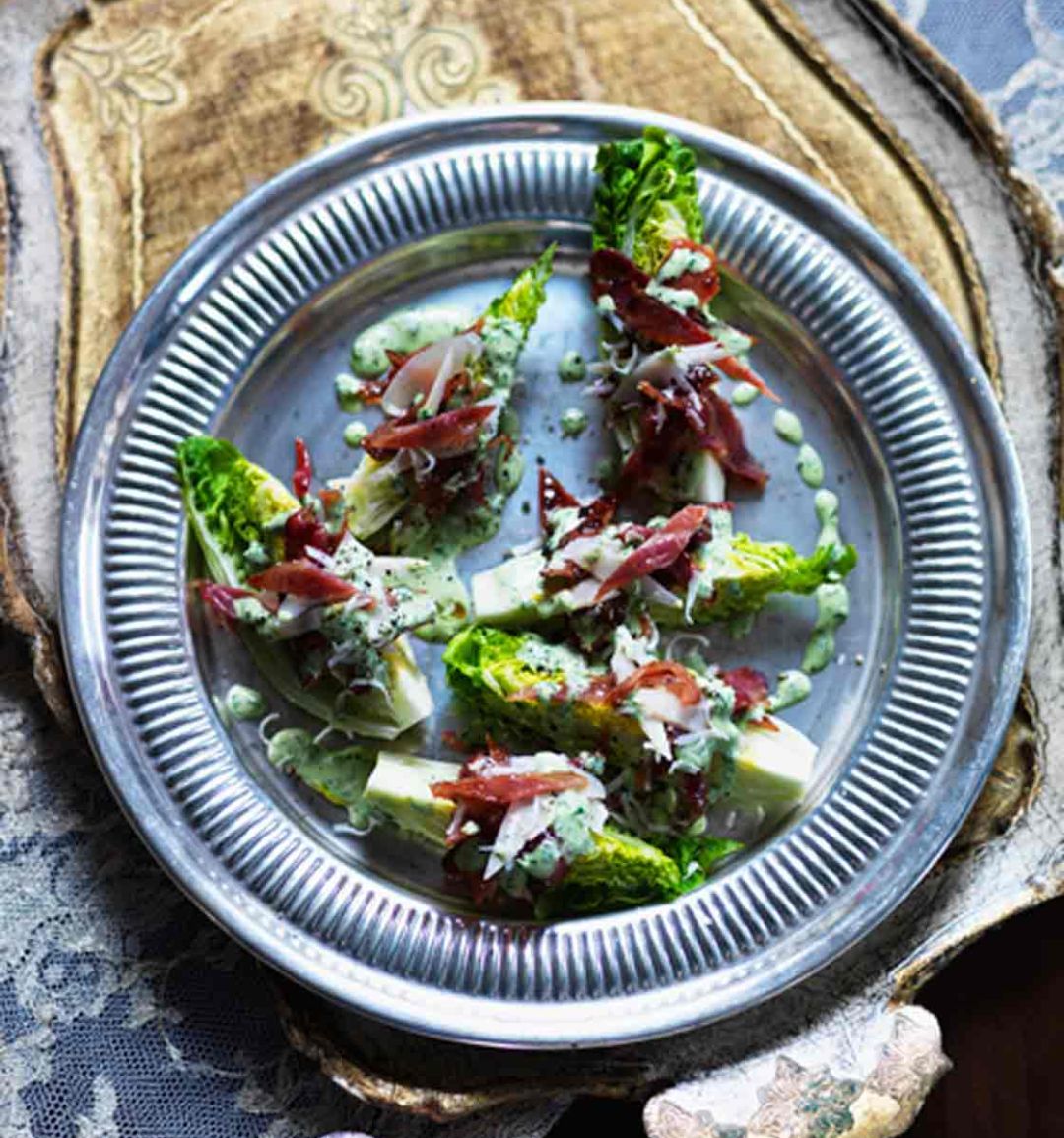 Lettuce wedge and candied bacon salad with green goddess dressing