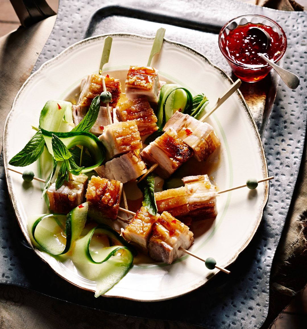 Crispy pork belly skewers with chilli garlic caramel dipping sauce