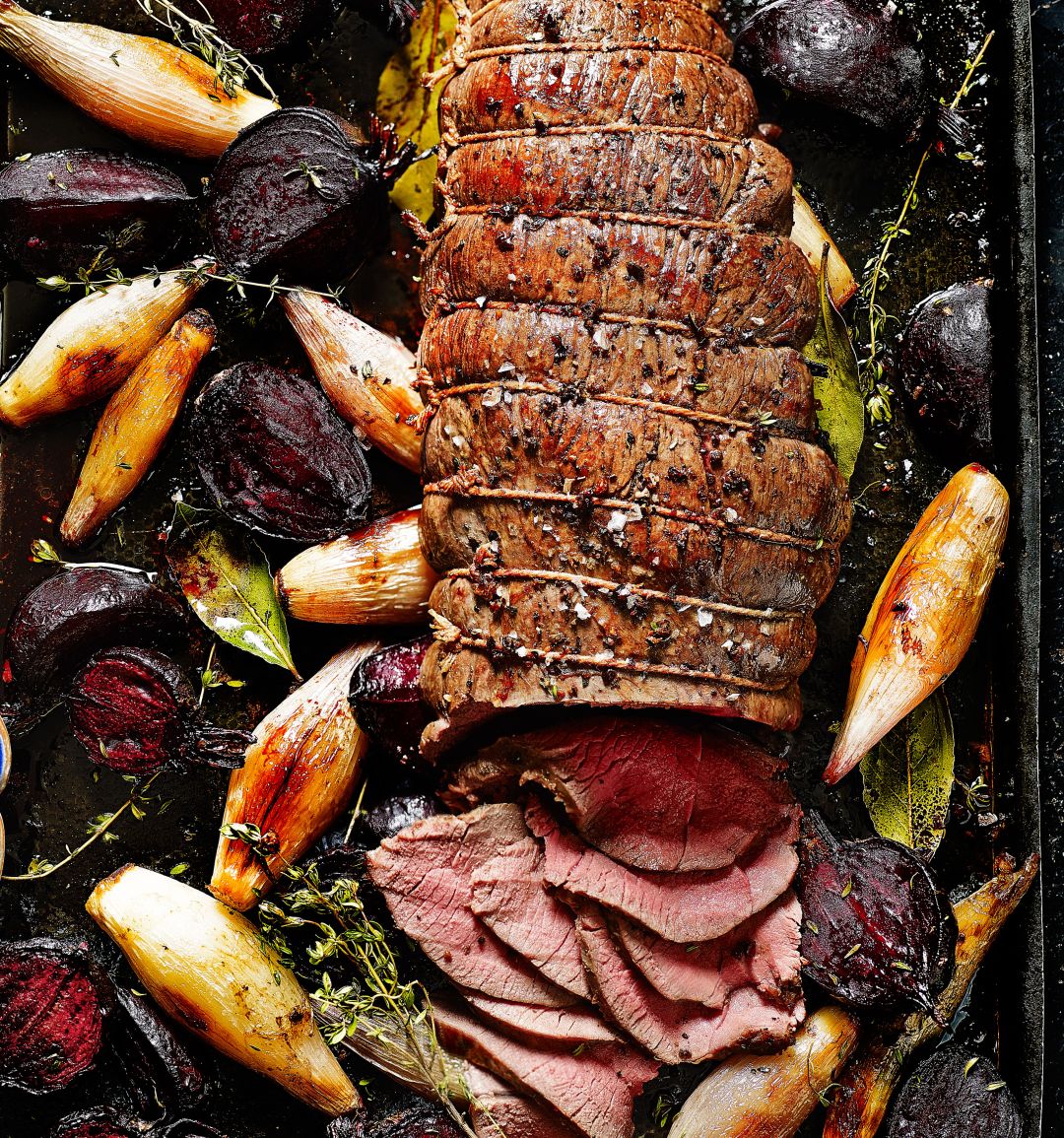 Roast venison haunch with beetroot, shallots and horseradish