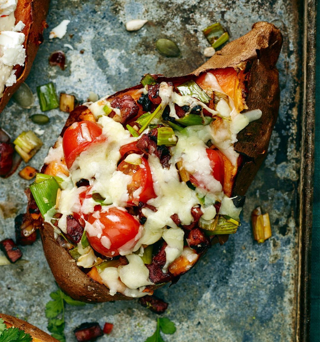 Baked sweet potato with chorizo and melting cheese