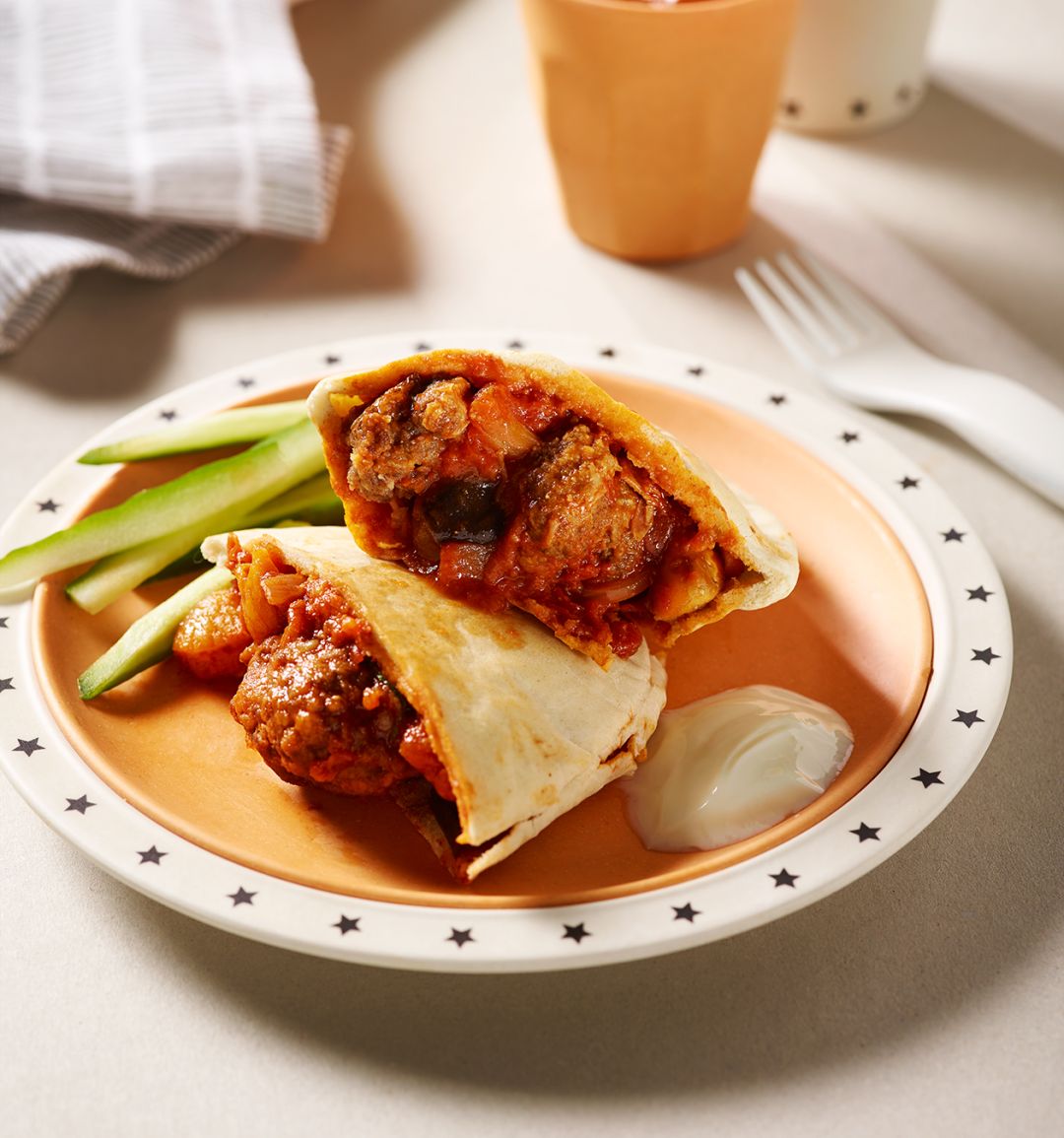 Beef and bean meatballs in spiced tomato sauce