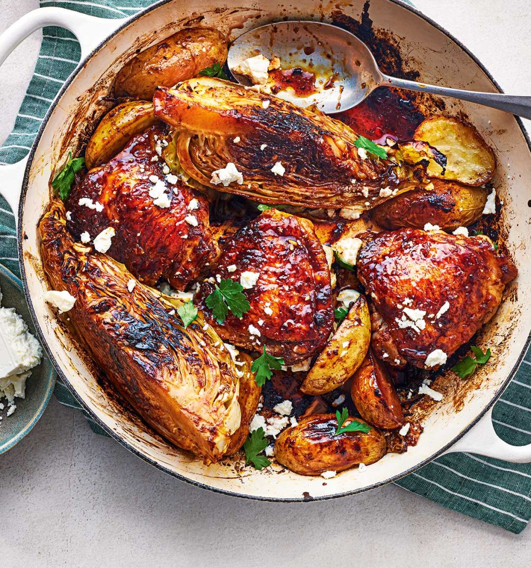 Sticky pomegranate chicken thighs and cabbage