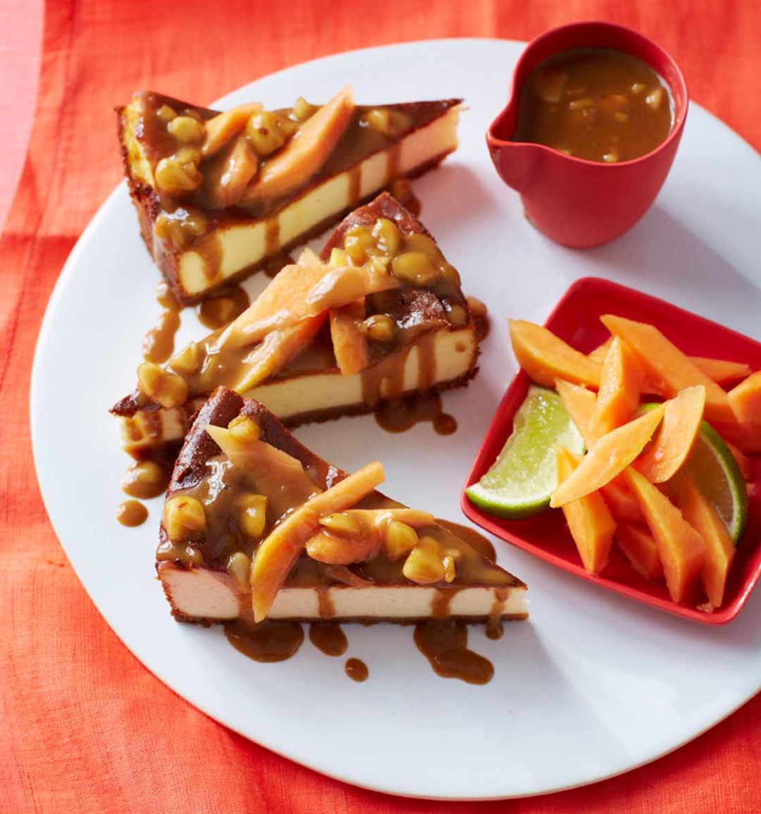 Coconut cheesecake with papaya and macadamia sauce