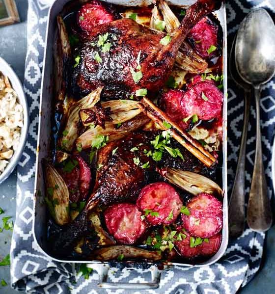 Sticky spiced duck legs  with plums