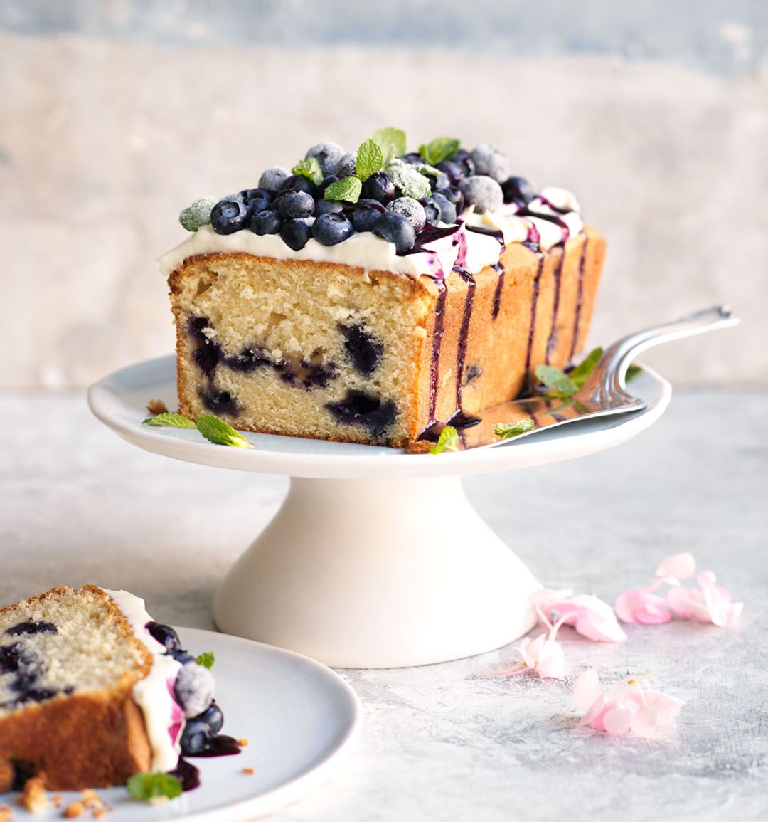 White chocolate and blueberry loaf cake with cheesecake frosting
