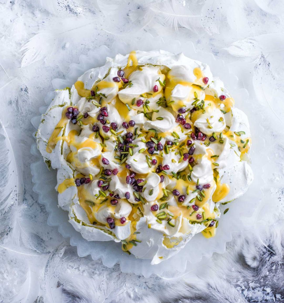 Saffron & pistachio pavlova with citrus curd