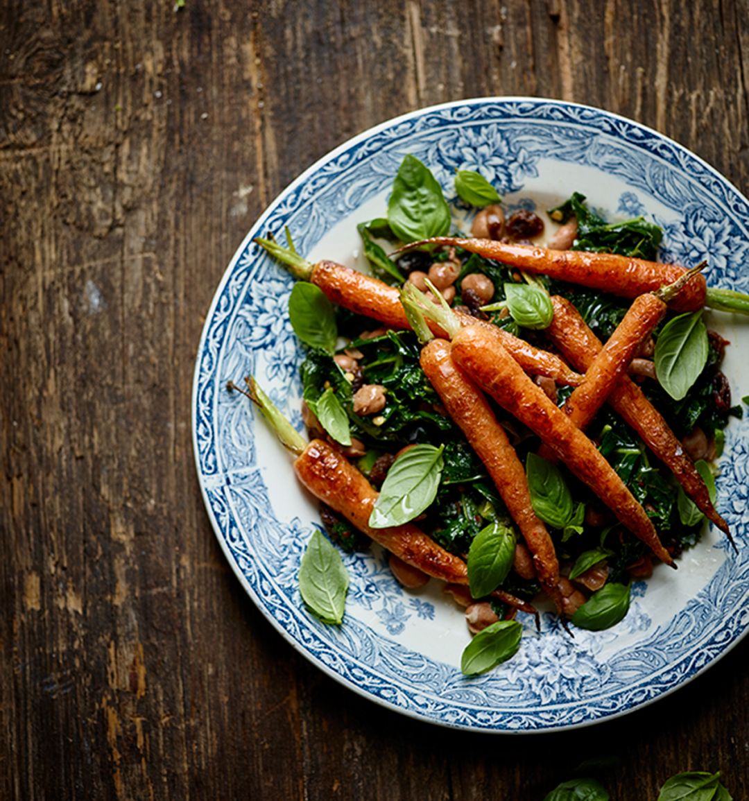 Warm carrot salad with spicy raisin and pine nut dressing 