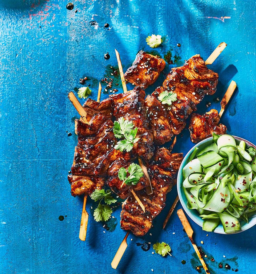 Sticky pork skewers with cucumber 