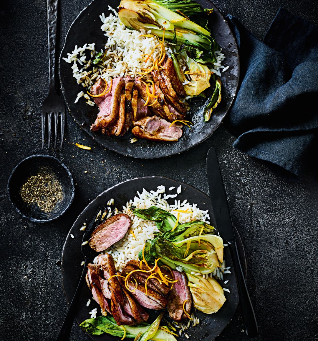 Spiced orange-glazed duck with gingered pak choi