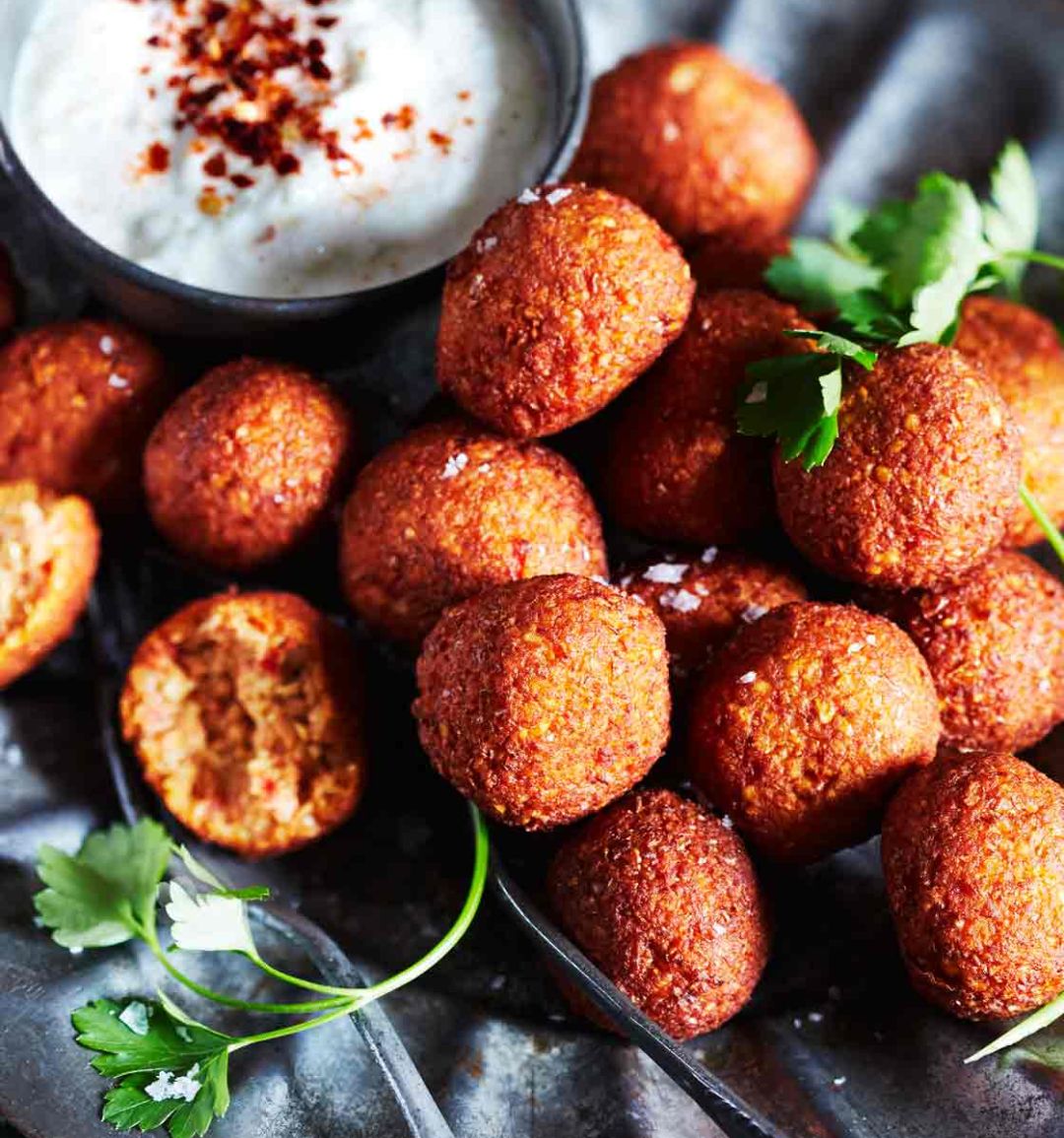 Fragrant spiced red pepper falafel with smoky yogurt dip