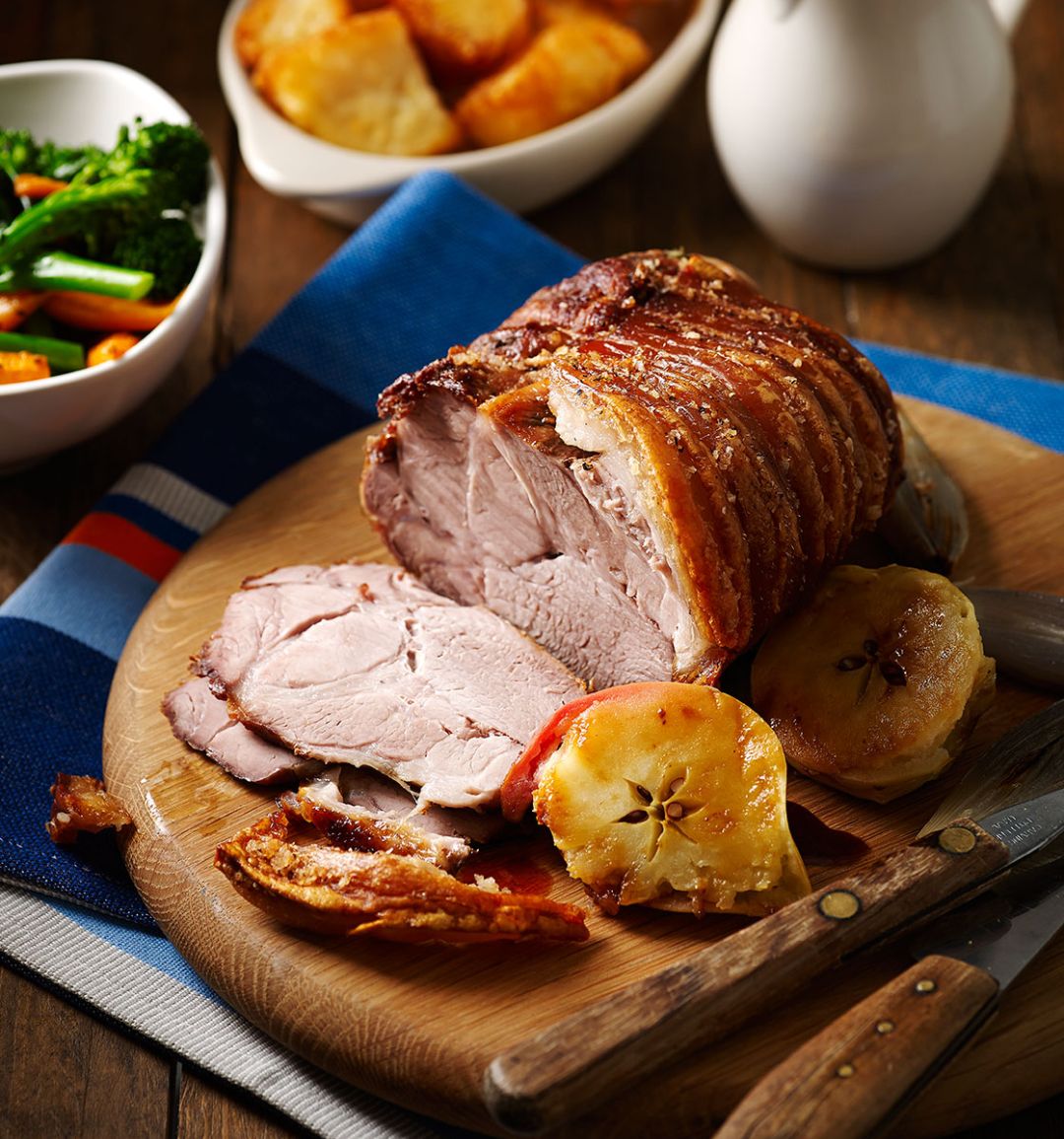 Roast pork shoulder with crackling and cider gravy
