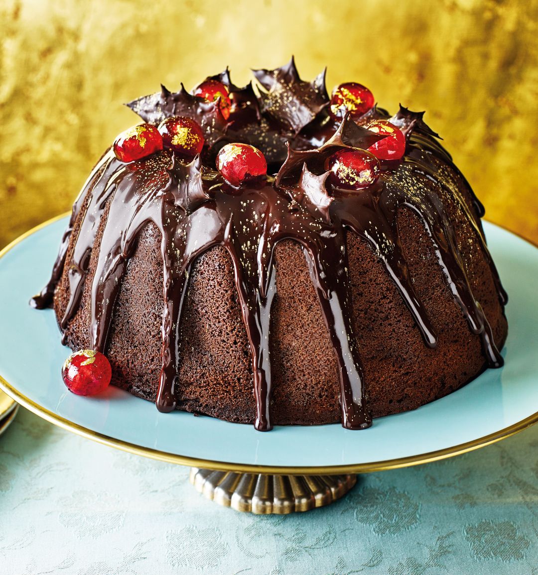 Mulled wine bundt cake with chocolate holly and gilded cherries