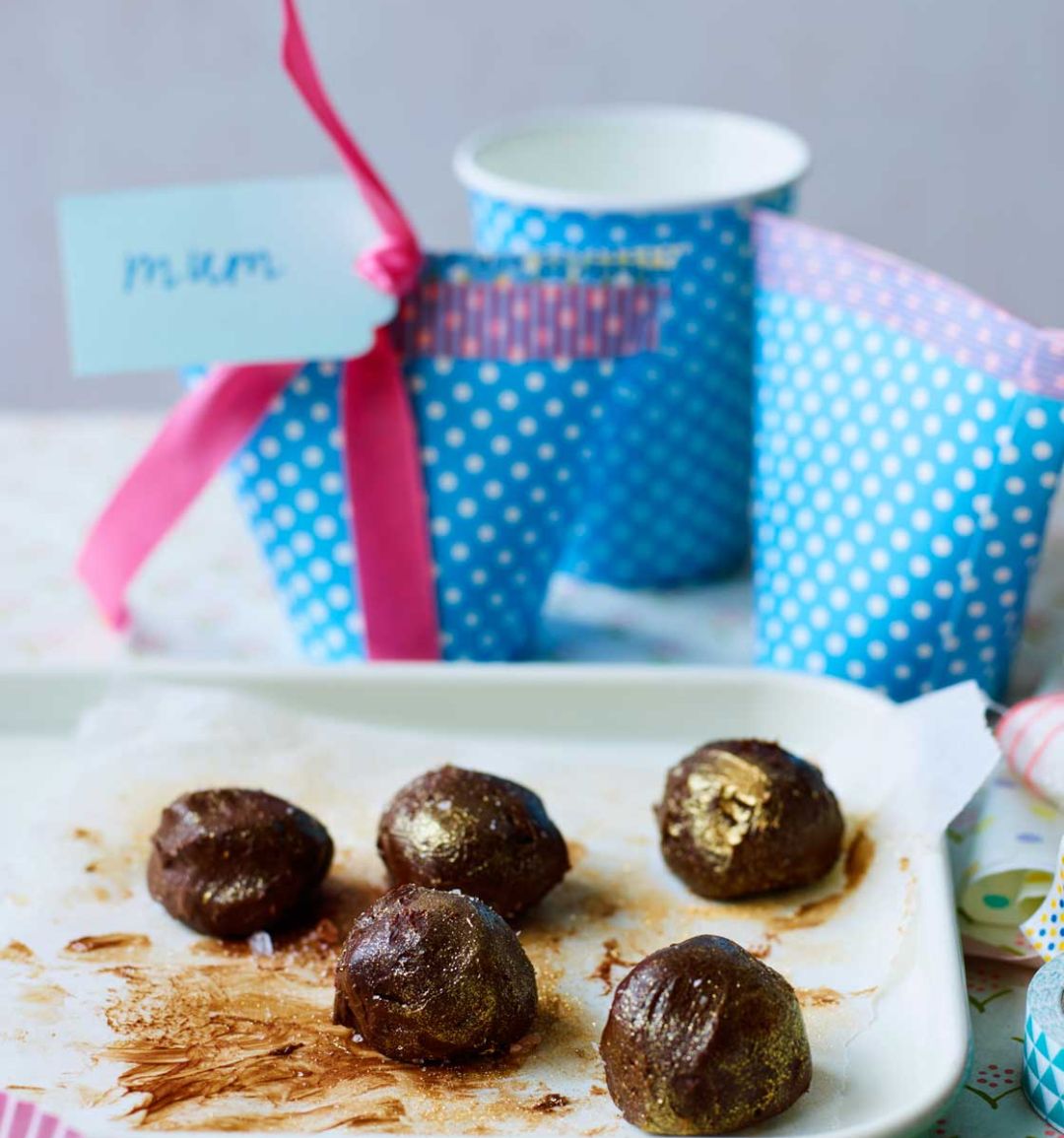 Gold-dusted salted chocolate truffles