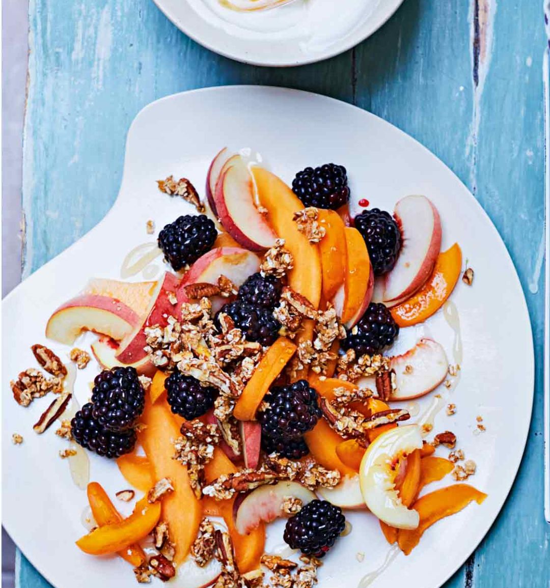 Breakfast fruit salad with pecan granola