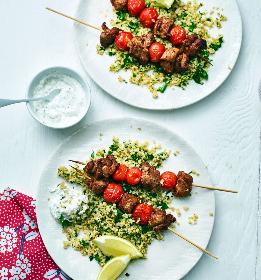 Spicy lamb skewers with herby bulgur