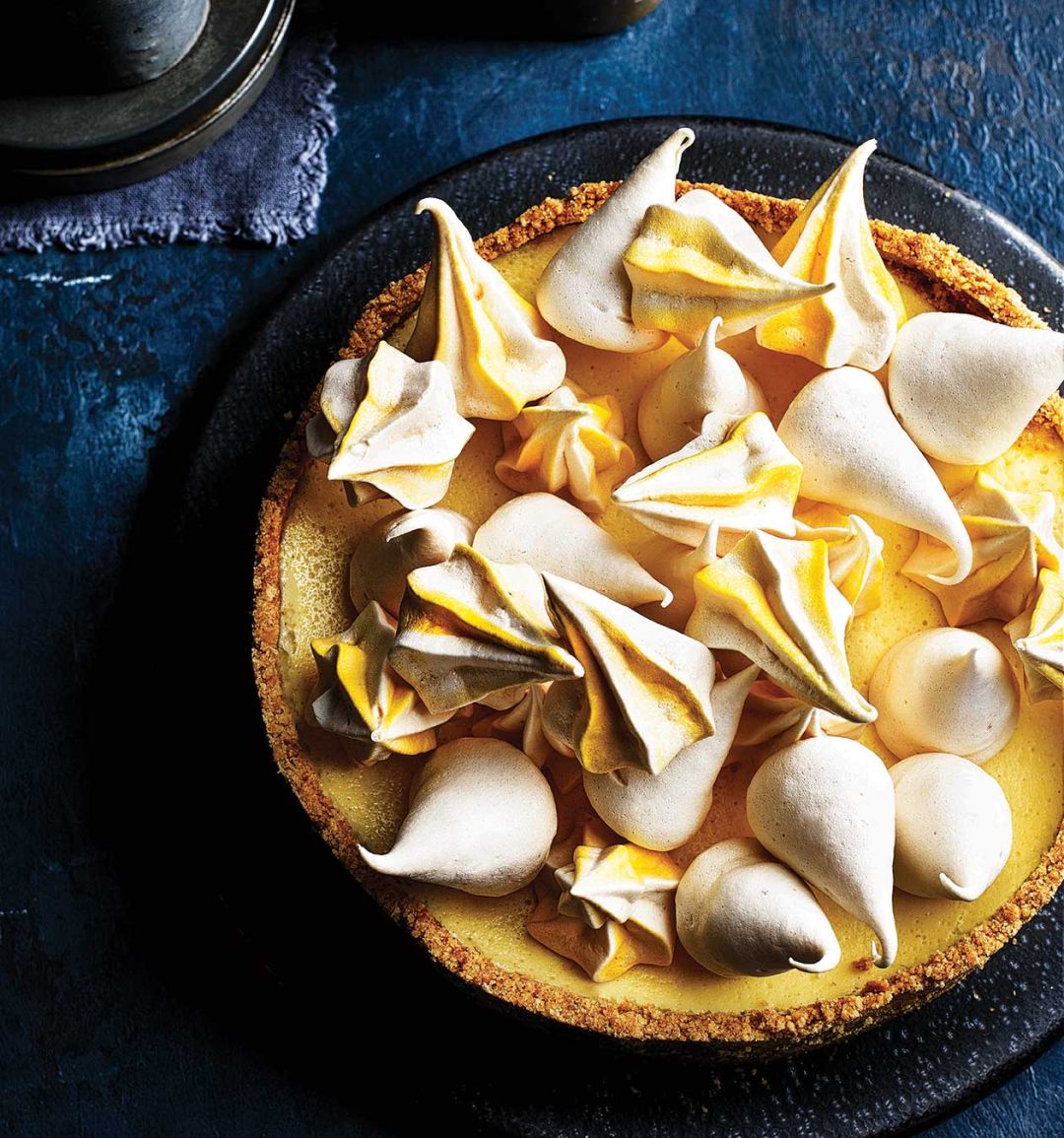 Lemon passion fruit cheesecake with mini meringues
