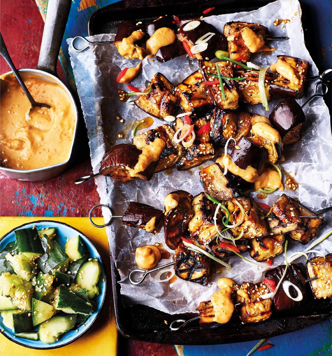 Aubergine skewers with satay sauce and smashed cucumber