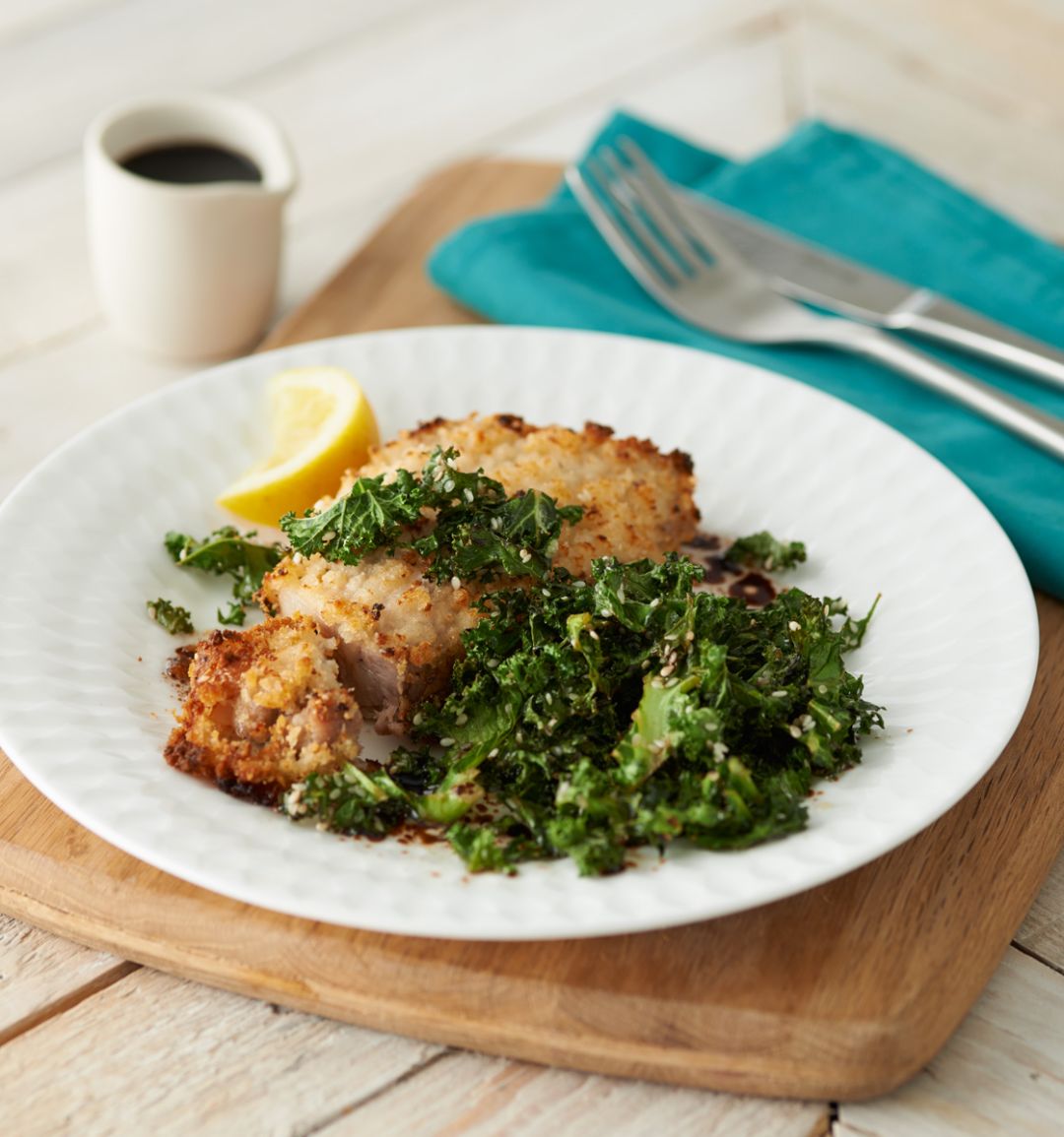 Breaded pork chops with crispy sesame and balsamic kale