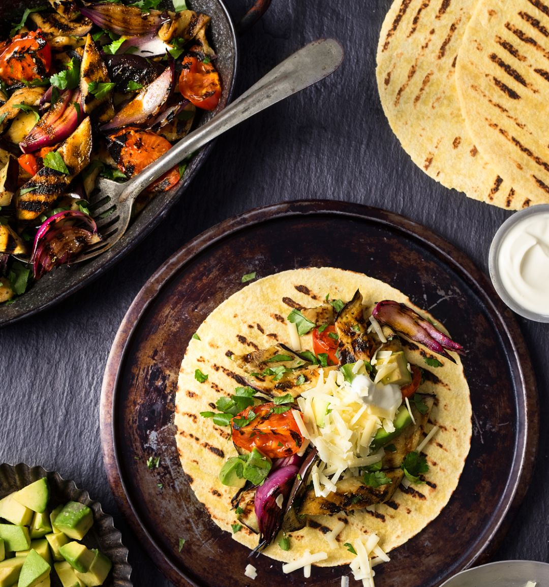 Charred aubergine and tomato wraps