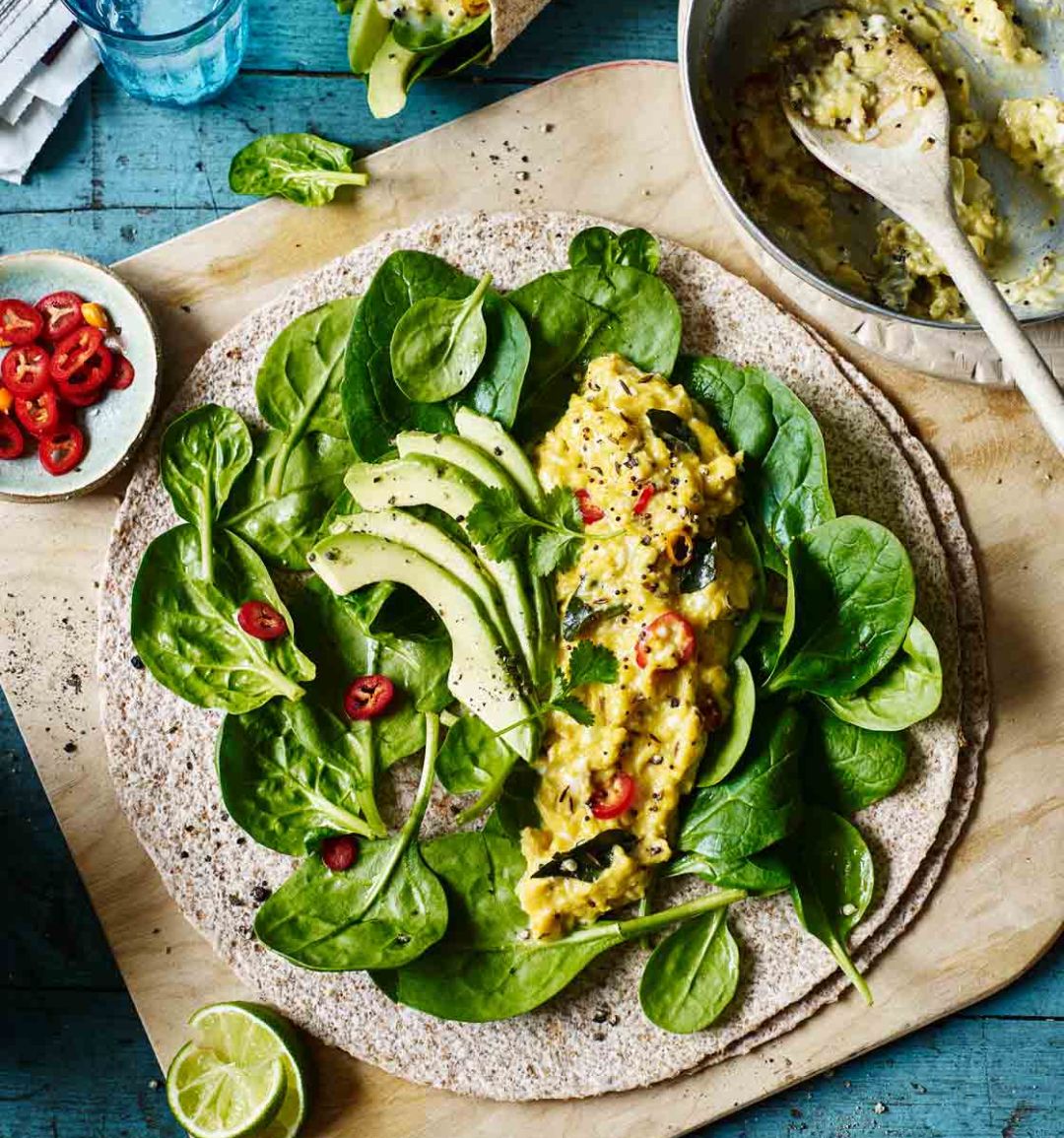 Scrambled egg wrap with Indian spices, avocado and greens
