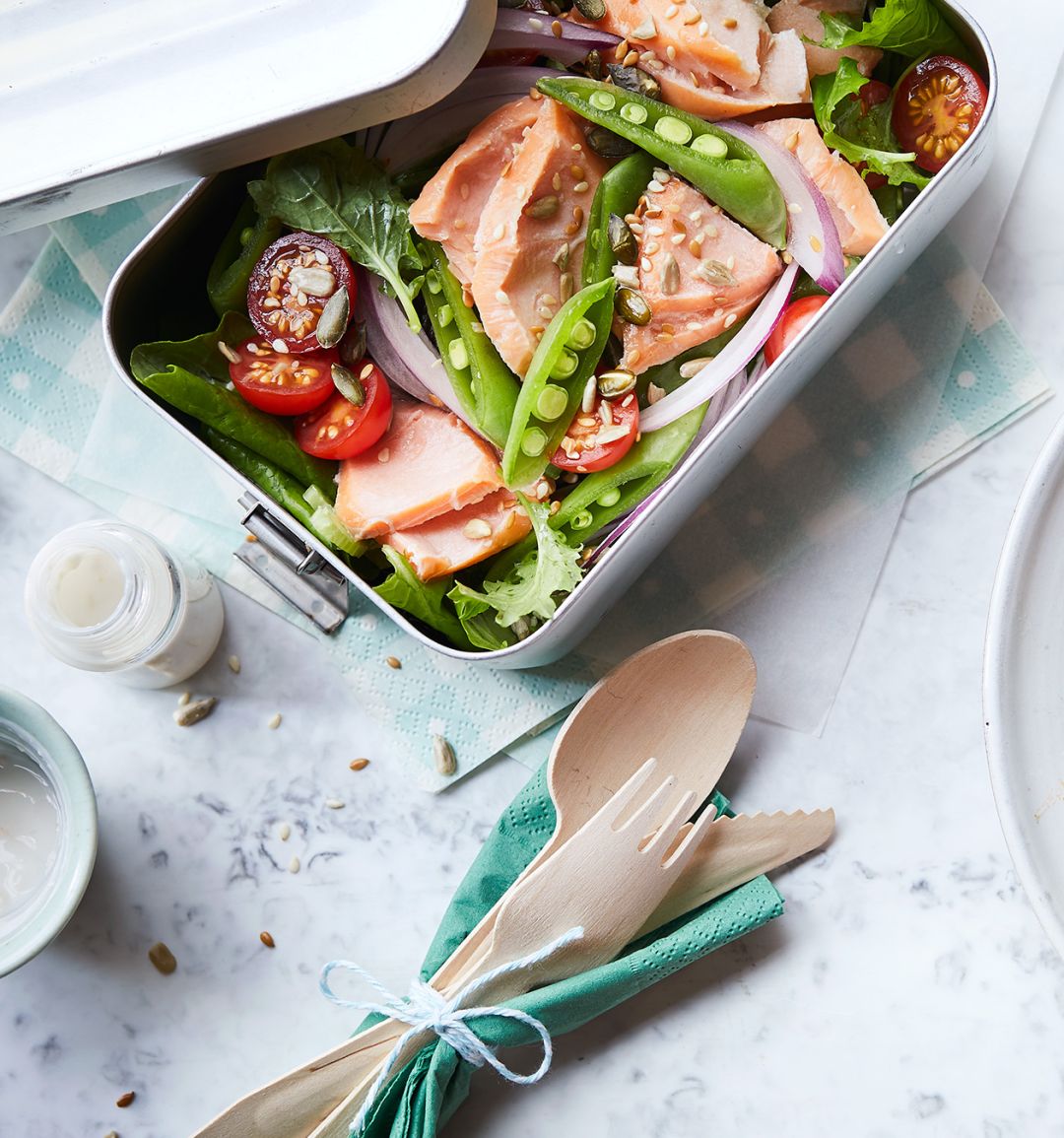 Hot smoked salmon salad with horseradish dressing