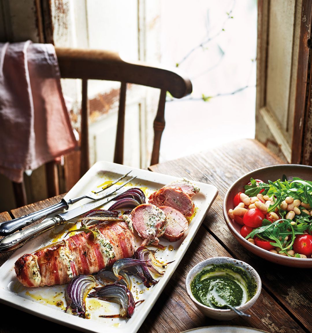 Stuffed roast pork fillet with cannellini bean and tomato salad