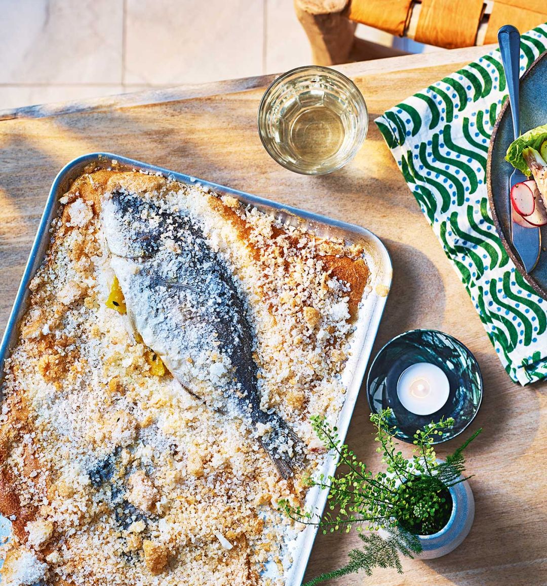 Salt-baked bream with pickled radish and pea salad