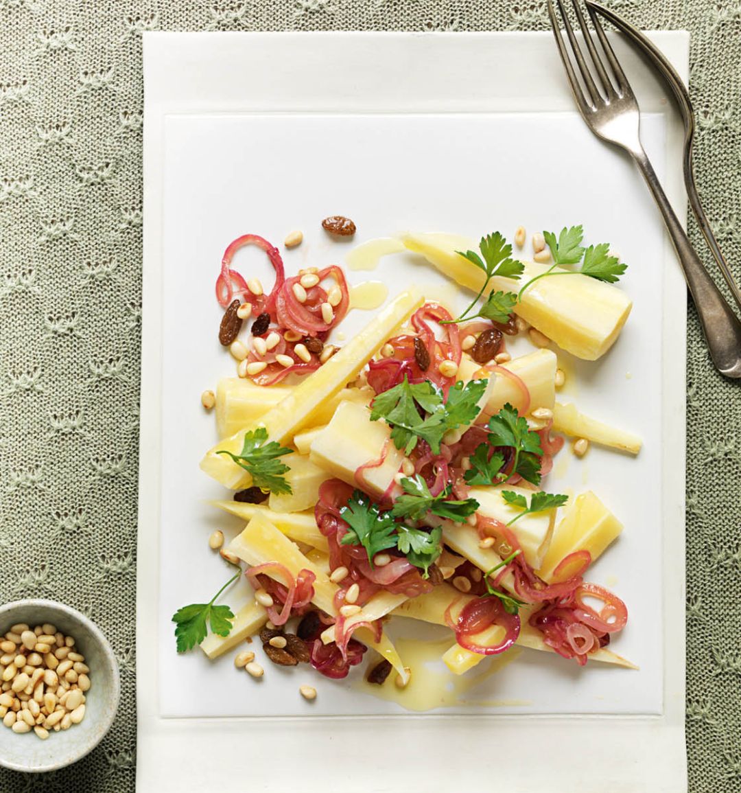 Steamed parsnips with sultanas and pine nuts