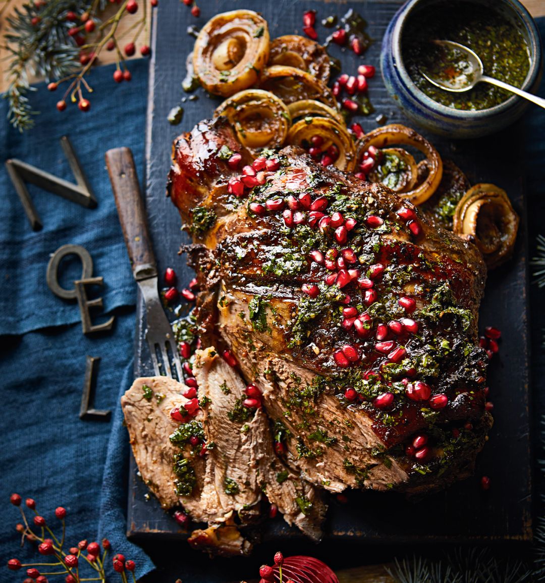 Spiced pomegranate and clementine slow-roast lamb leg
