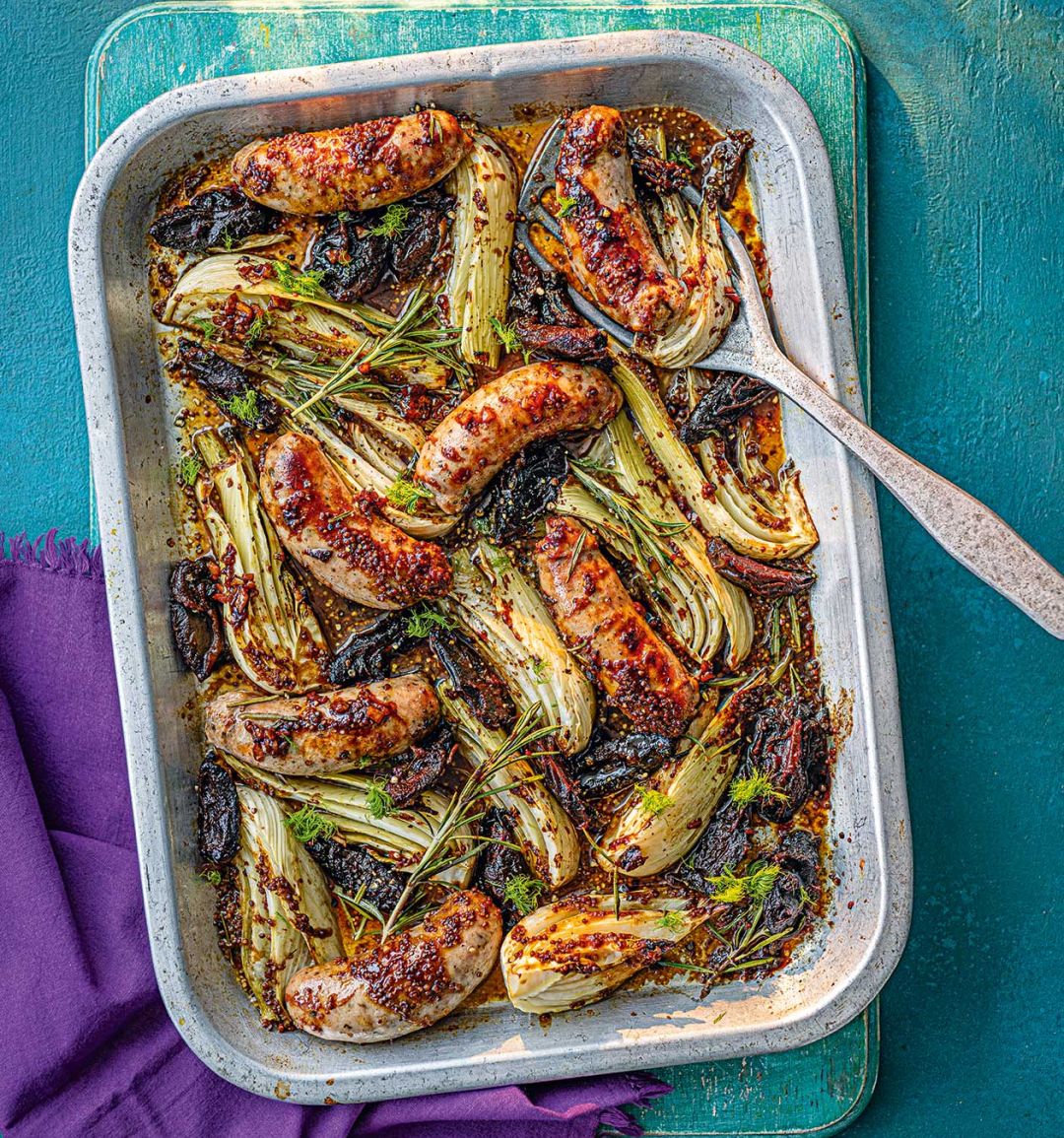 Sticky sausage, date and mustard traybake