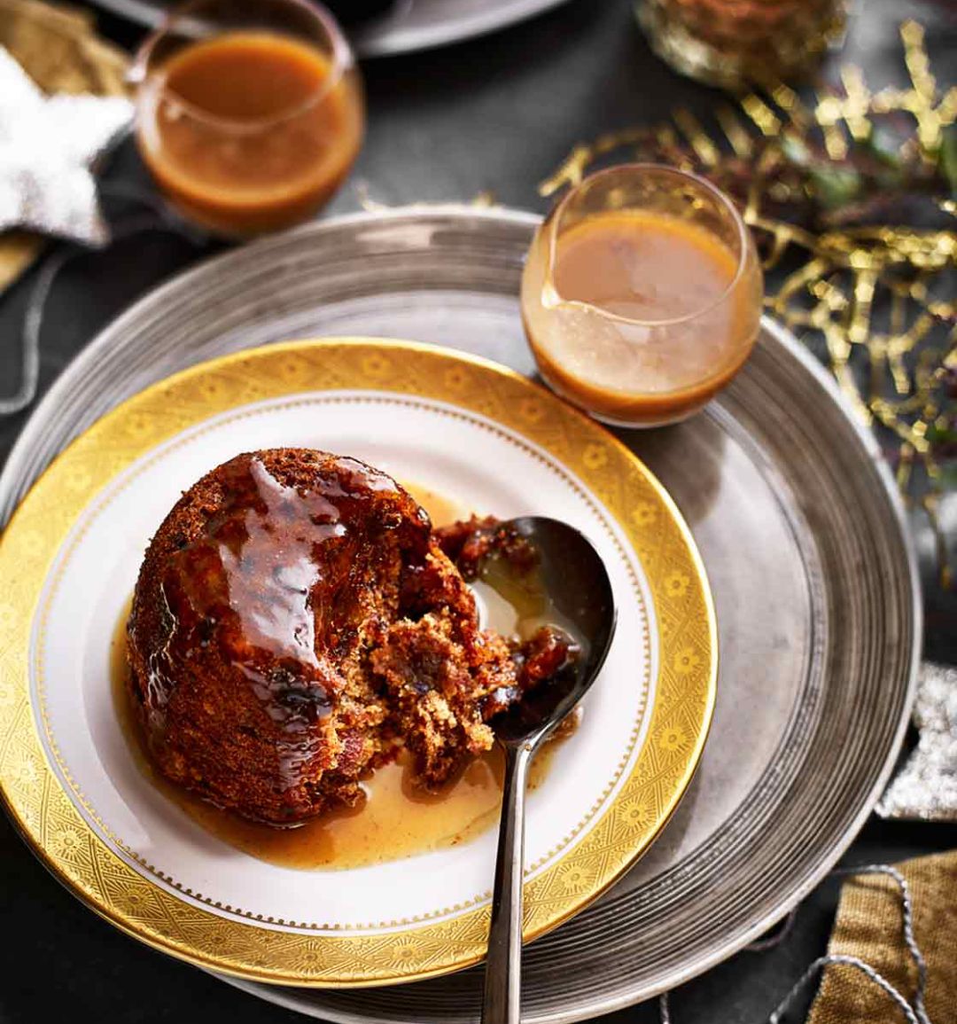 Gluten-free mini Christmas puddings with spiced toffee sauce 